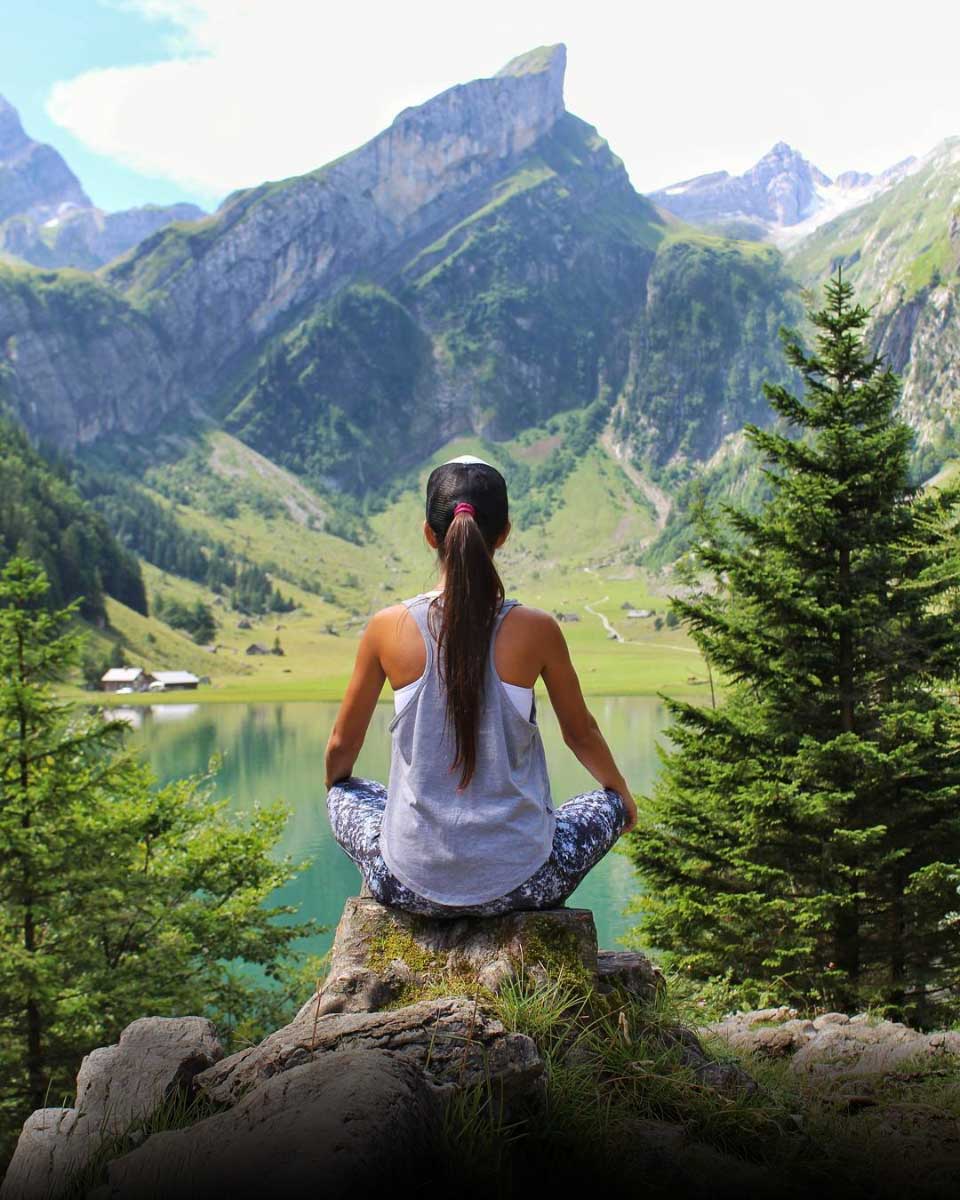 Meditating beside a mountain lake